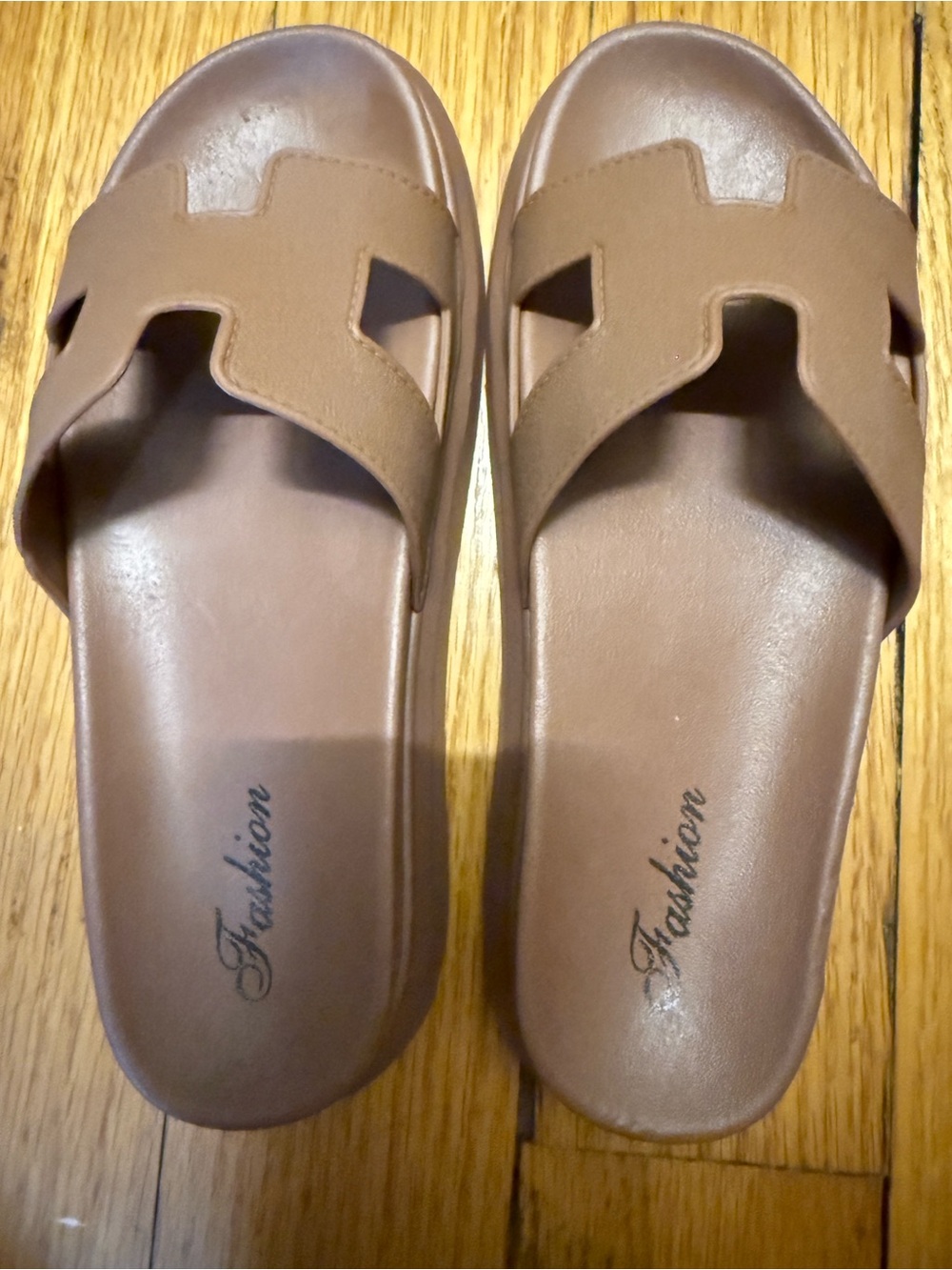 Classic brown slides with a unique design